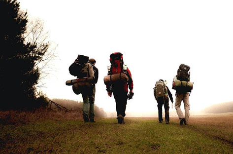 Hikers walking up a hill