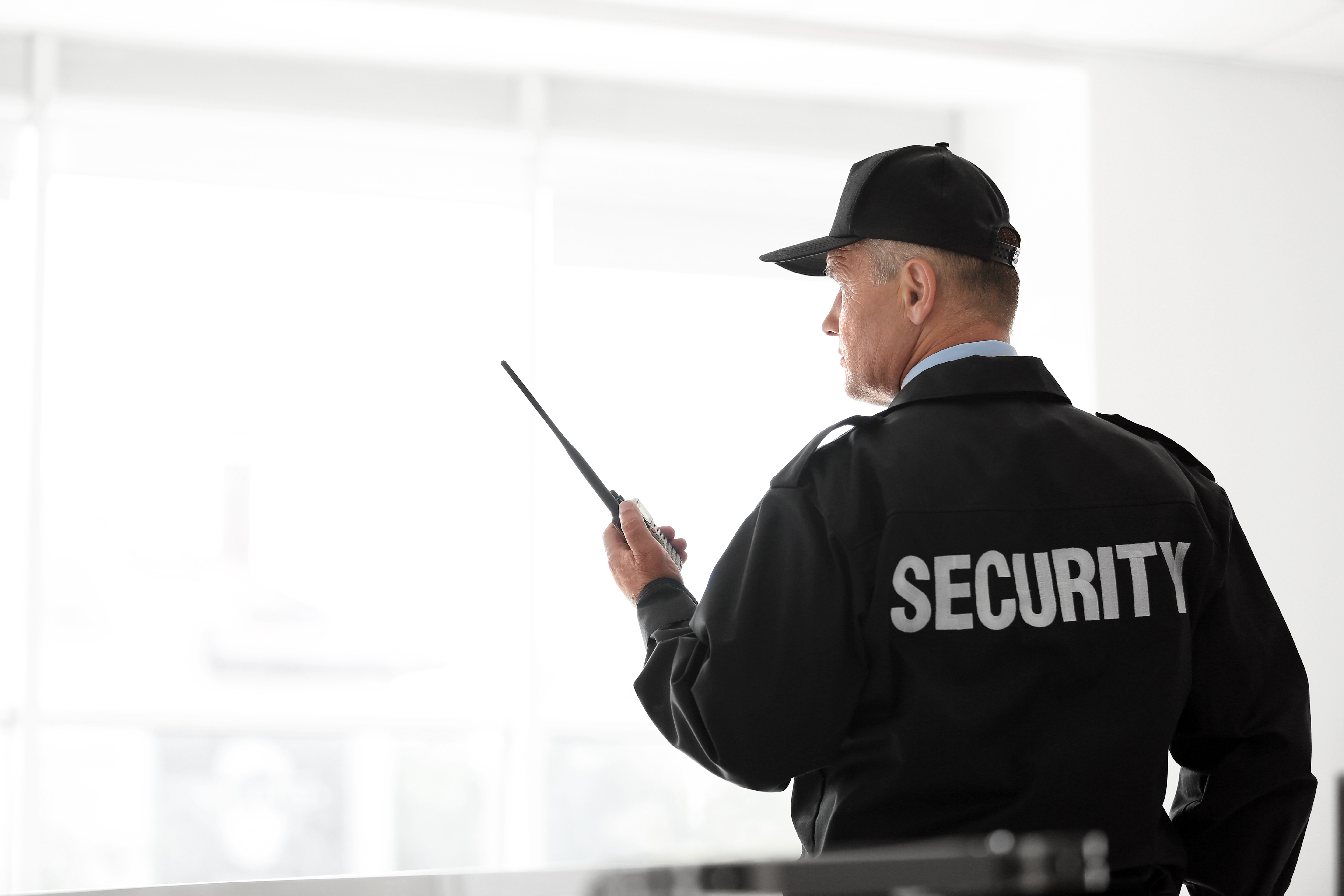 Security officer with walkie talkie